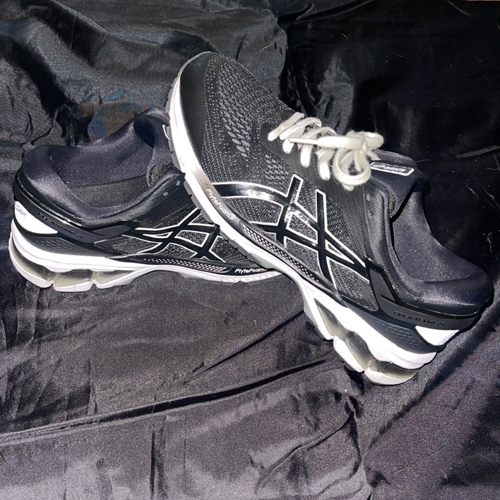 Fairly new Asics FLYTEFOAM women’s athletic/running shoes, size 9.5 US women’s.